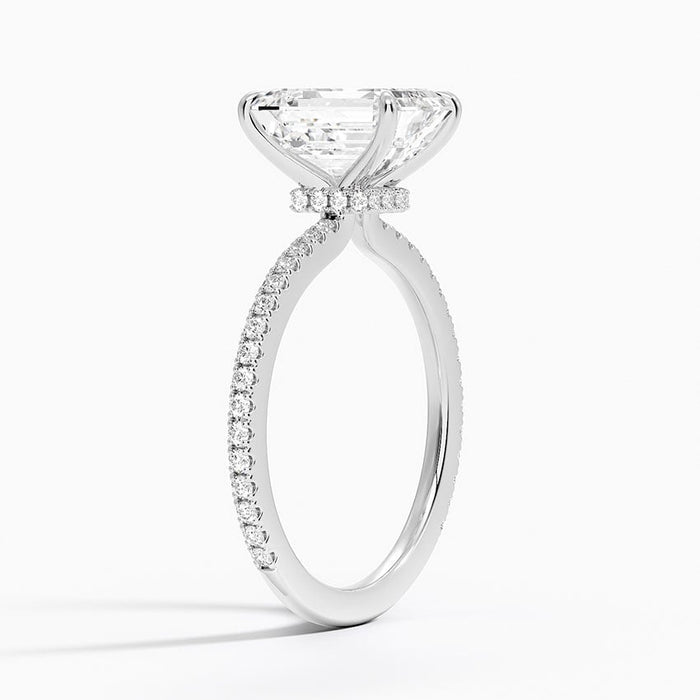 Side profile showing the scalloped three quarter pave band and hidden halo
