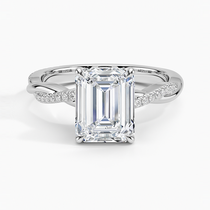 Emerald cut moissanite twisted pave infinity engagement ring in white gold, top view