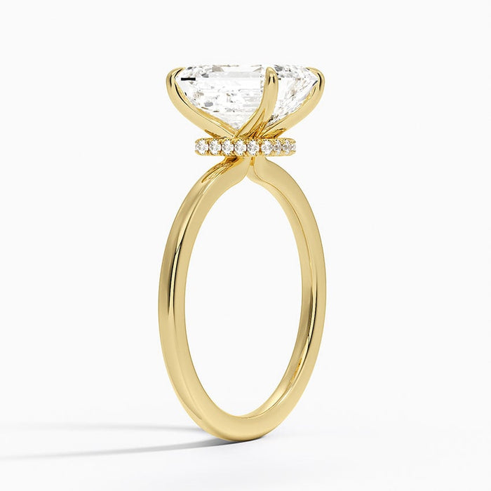 Side profile showing the secret halo of micro pave under the emerald cut crown