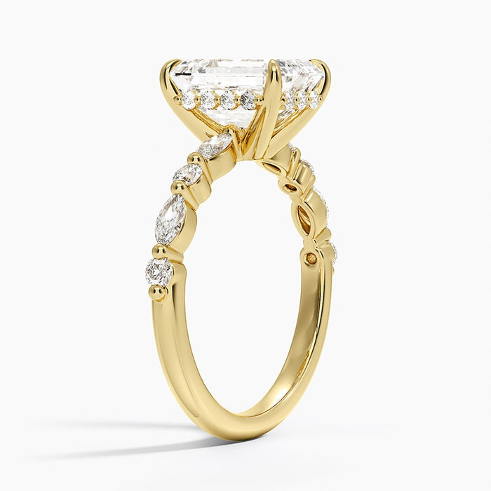 Side profile showing shared prong marquise and round stones and the hidden halo