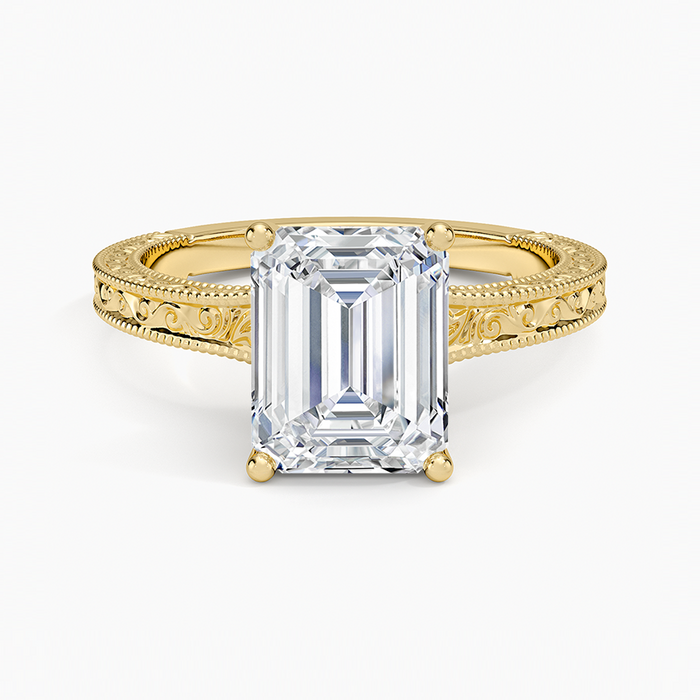 Emerald cut moissanite antique hand engraved filigree ring in yellow gold, top view