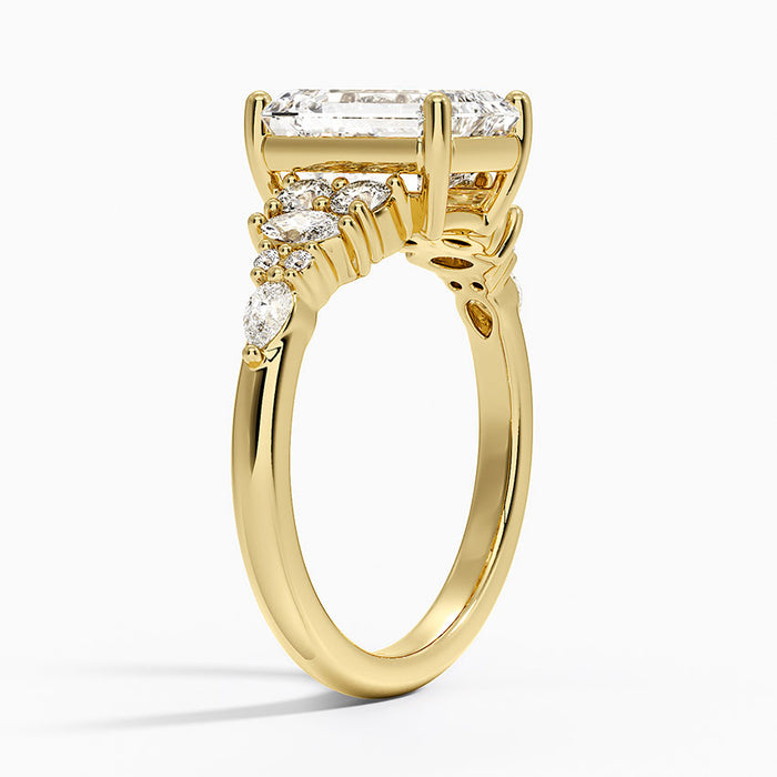 Side profile showing the graduated marquise cluster and fluted gallery