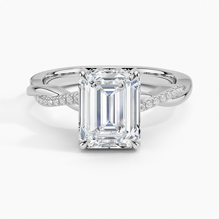 Emerald cut moissanite petite twisted vine ring with hidden halo in white gold, top view