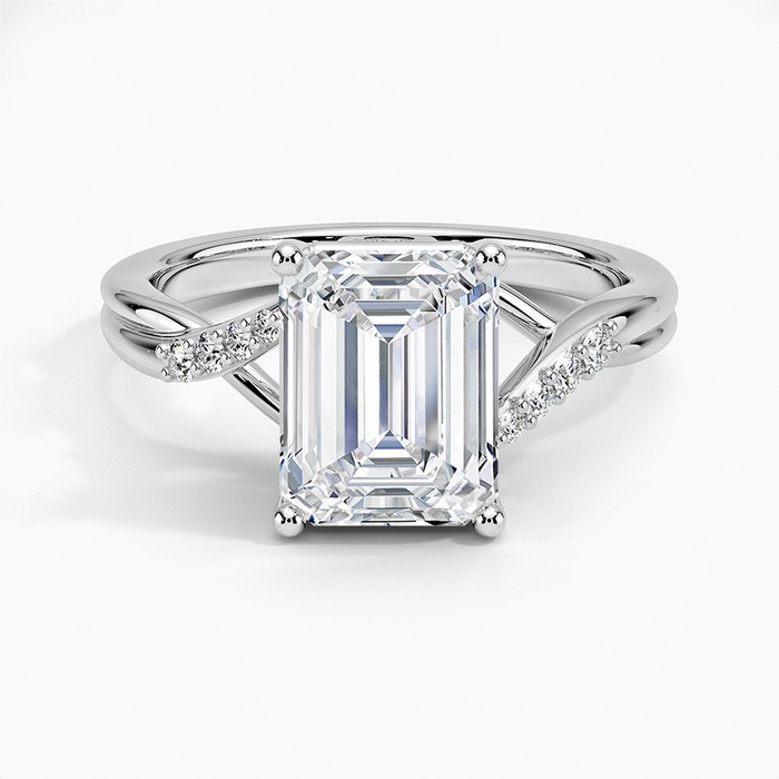 Emerald cut moissanite infinity twist pave solitaire ring in white gold, top view