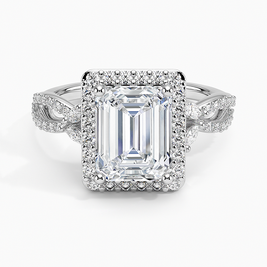 Emerald cut moissanite rectangular halo ring with infinity twist shank in white gold, top view