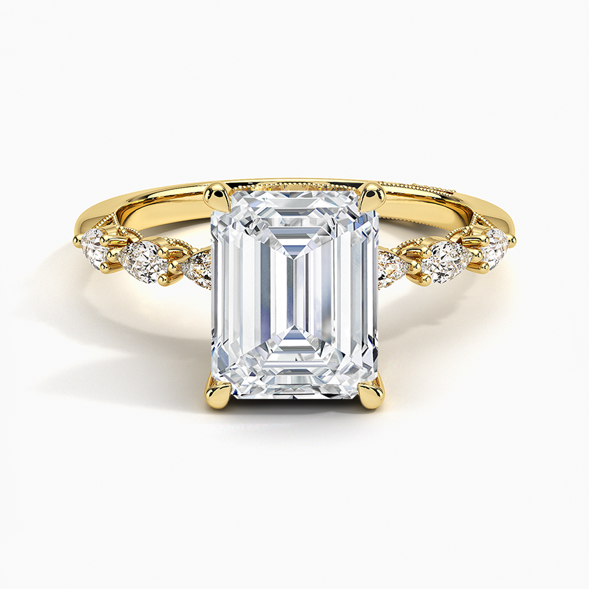 Emerald cut moissanite vintage milgrain ring with hidden halo in yellow gold, top view