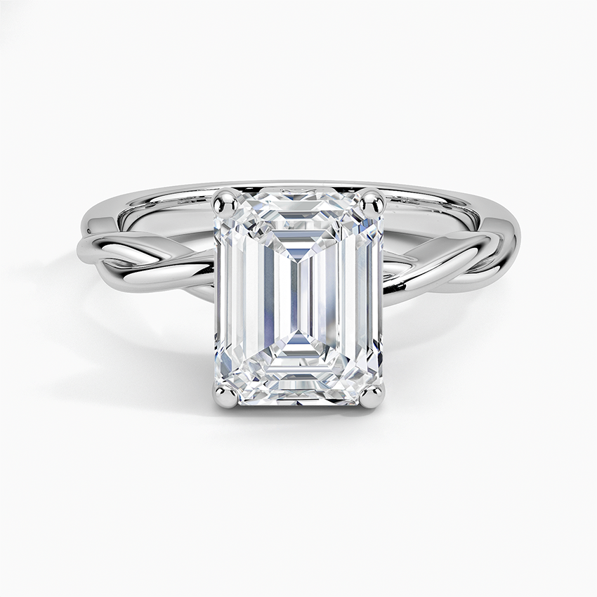 Emerald cut moissanite on a twisted rope band in white gold, top view