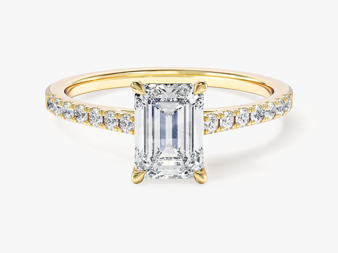 Emerald cut lab grown diamond pave band engagement ring in yellow gold, front view