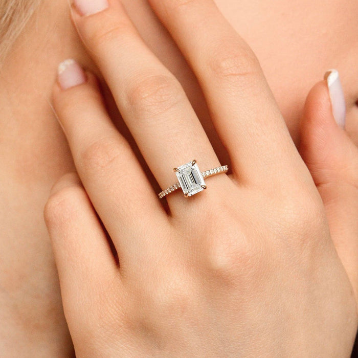 Emerald cut moissanite pave band engagement ring in rose gold