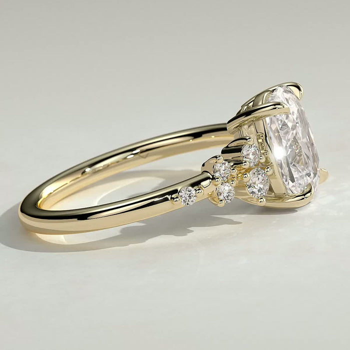 Elongated cushion moissanite scattered cluster shoulder engagement ring in yellow gold, view 2