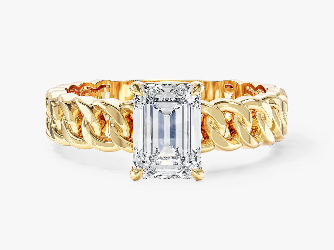 Emerald cut moissanite solitaire engagement ring with Cuban chain link band in 14K yellow gold, front view