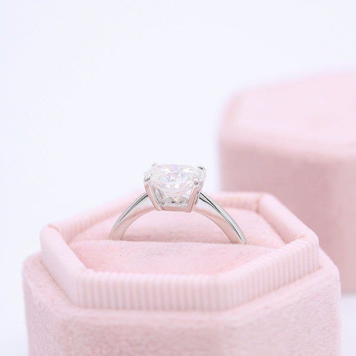 East west oval cut moissanite diagonal claw solitaire engagement ring in white gold, view 2