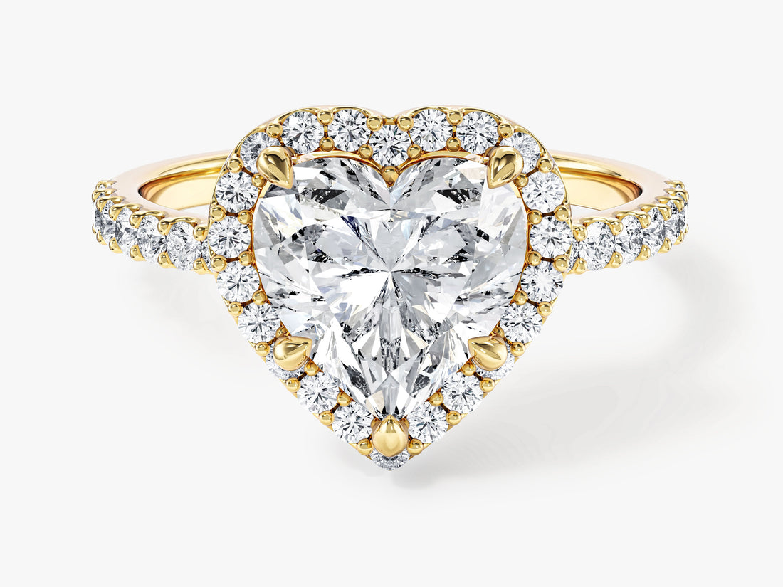 Heart shaped moissanite halo engagement ring with pave band in 14K yellow gold, front view
