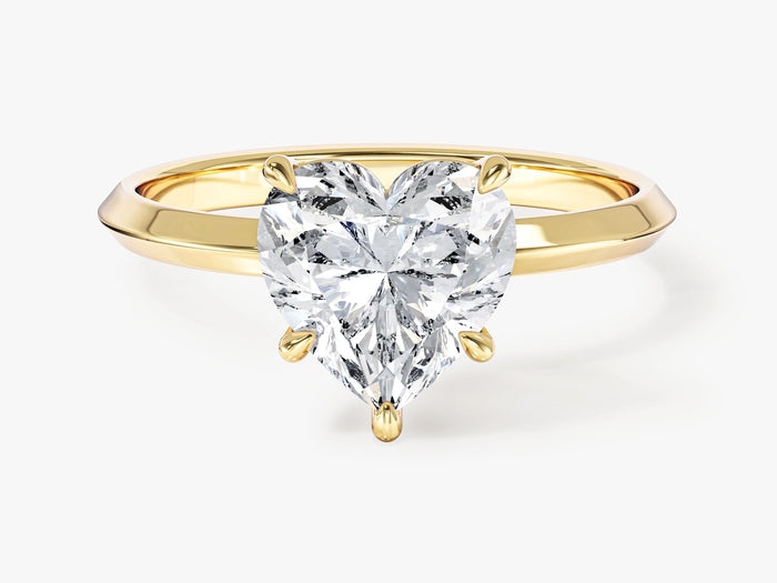 Heart lab grown diamond knife edge solitaire engagement ring in yellow gold, front view