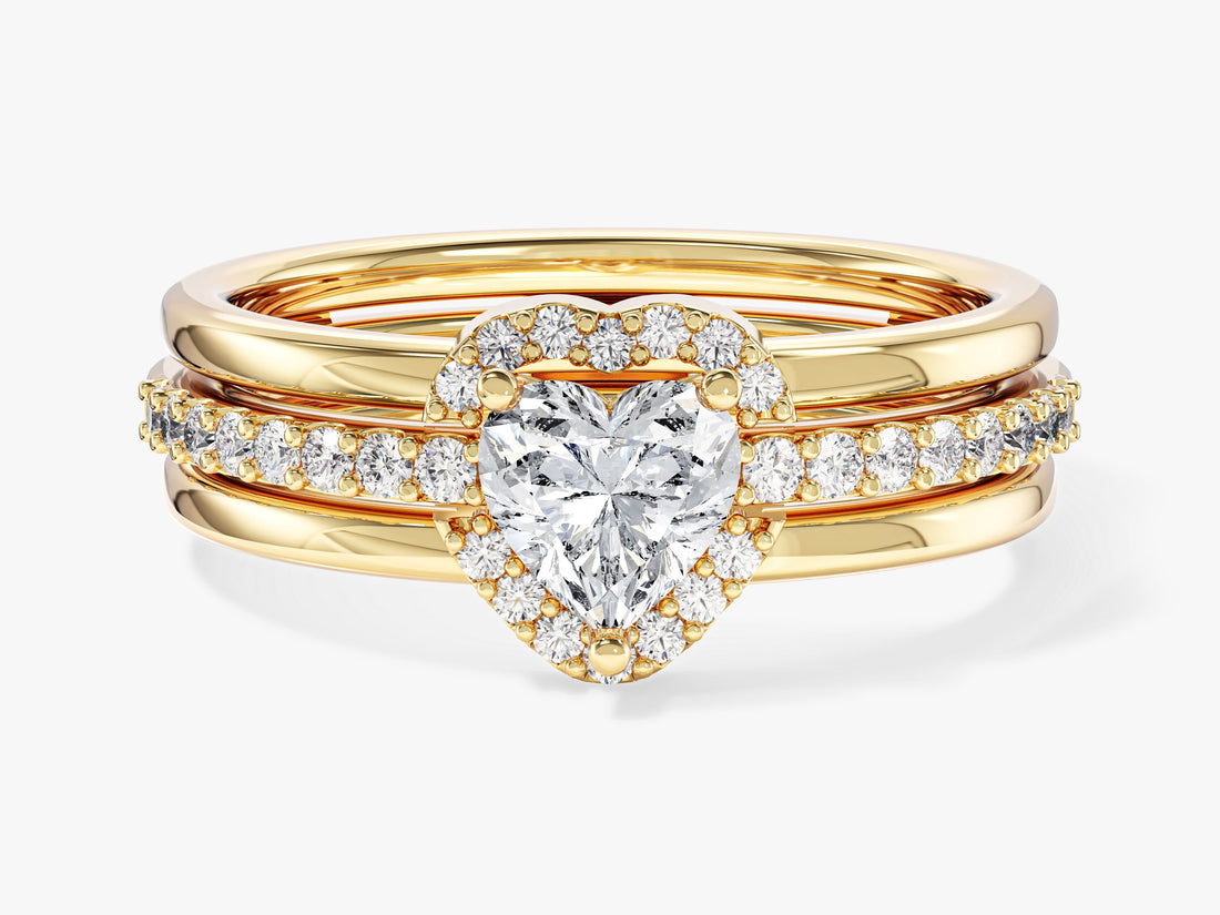 Heart shaped moissanite pave band engagement ring in 14K yellow gold, styled with an open heart enhancer band sold separately