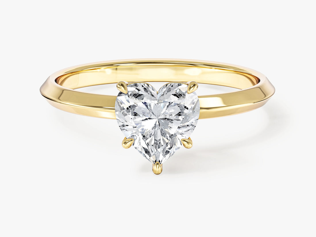 Dainty heart moissanite knife edge engagement ring in yellow gold, front view