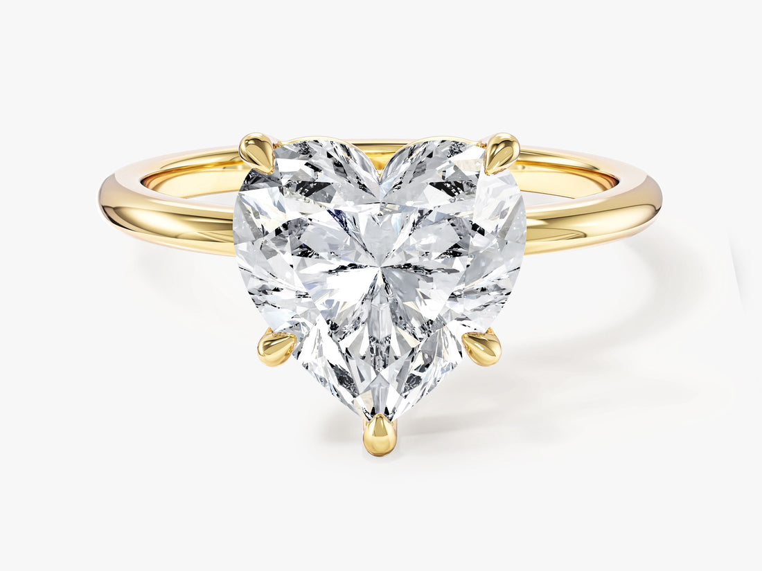 Large heart cut moissanite statement solitaire engagement ring in 14K yellow gold, front view