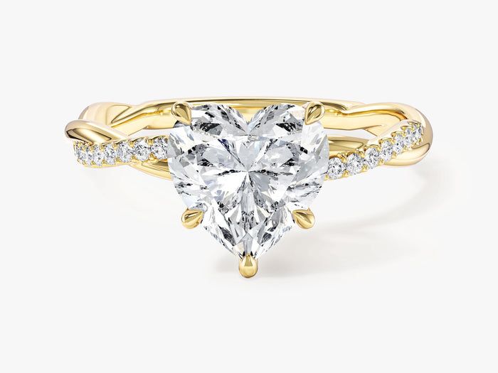 Heart moissanite engagement ring with intertwined micro pave band in yellow gold, front view