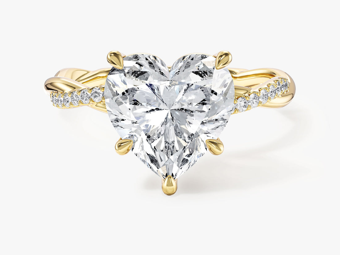 Large heart lab grown diamond crossover twist engagement ring in yellow gold, front view