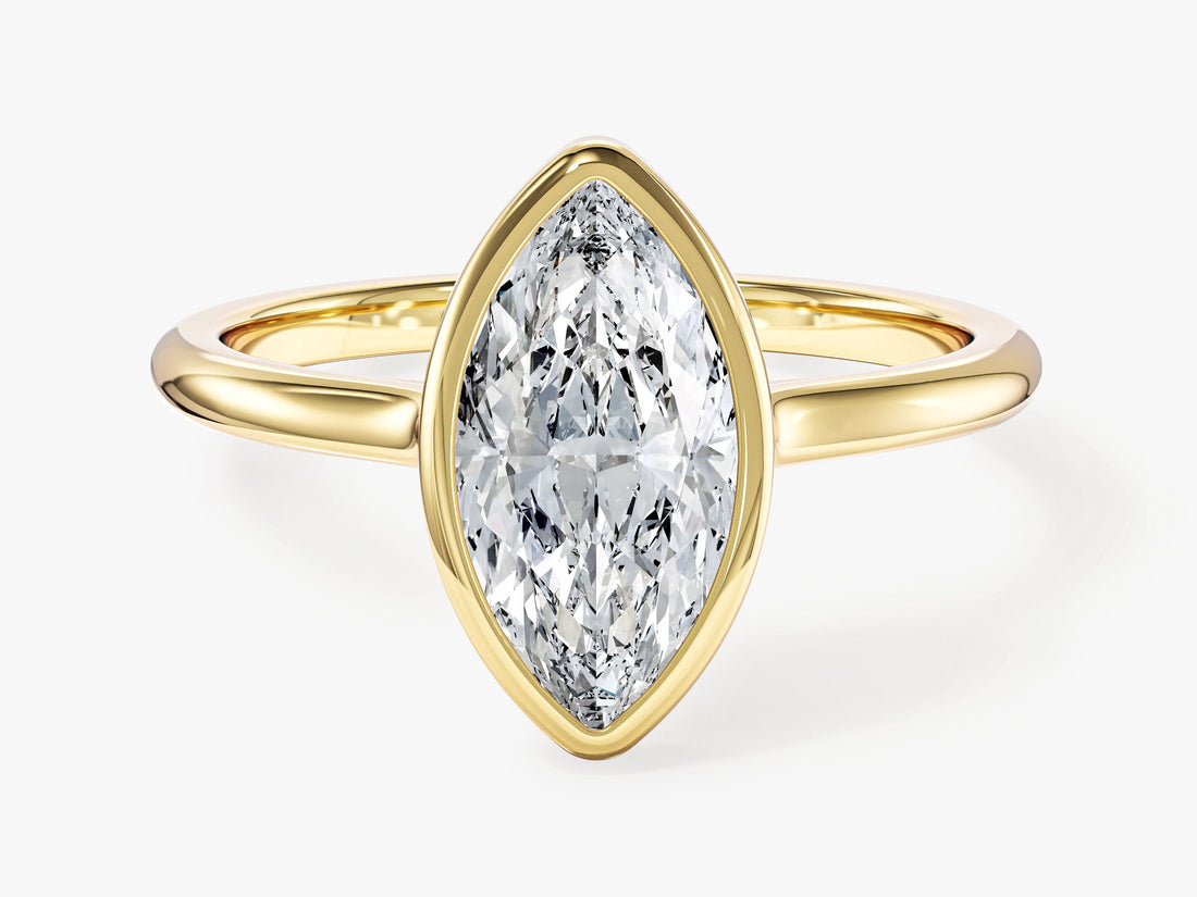 Bezel marquise moissanite solitaire engagement ring in yellow gold, front view
