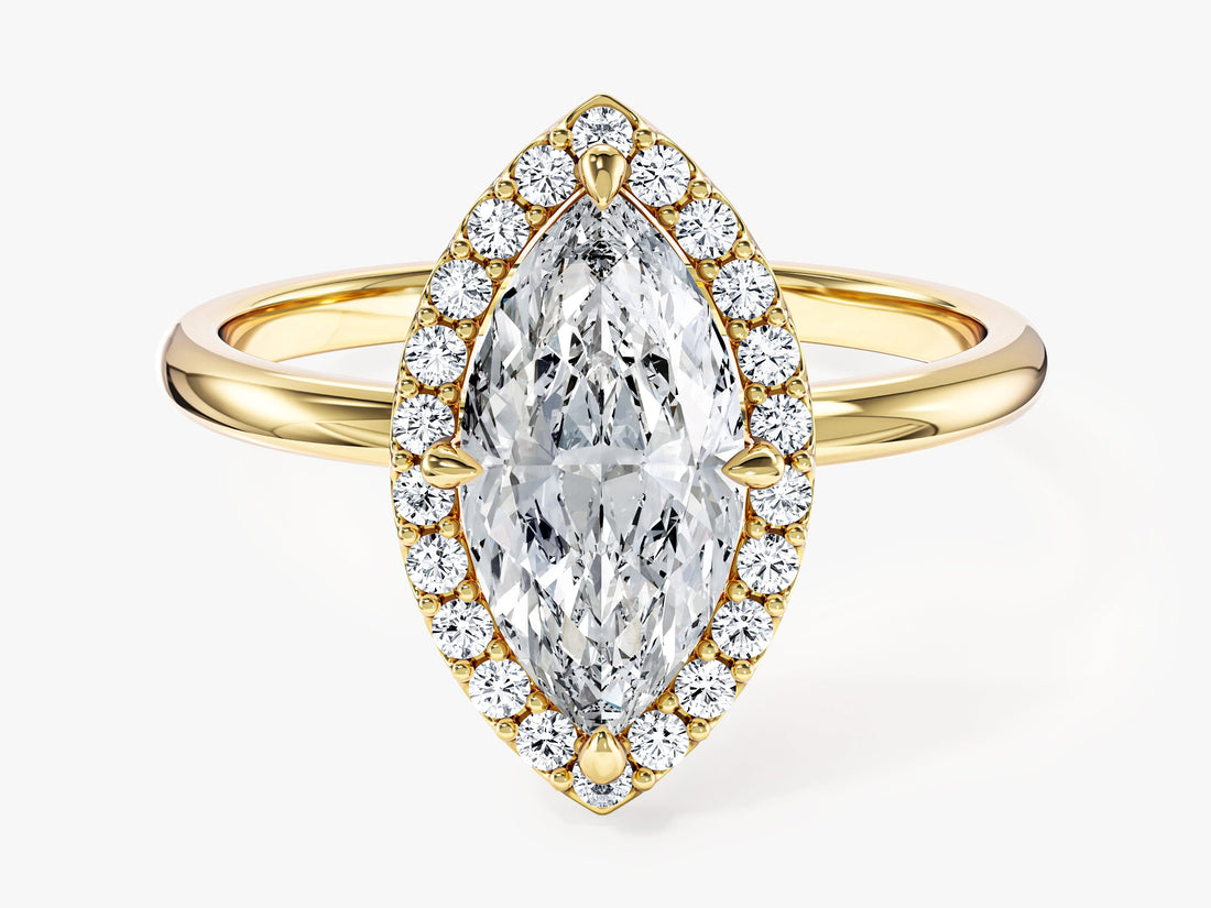 Navette marquise moissanite halo engagement ring on a slim band in 14K yellow gold, front view