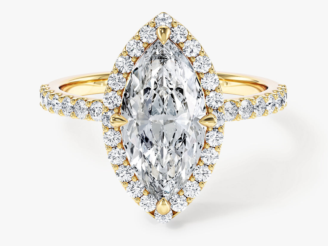 Large marquise moissanite halo engagement ring with V tip prongs and pave shoulders in 14K yellow gold, front view