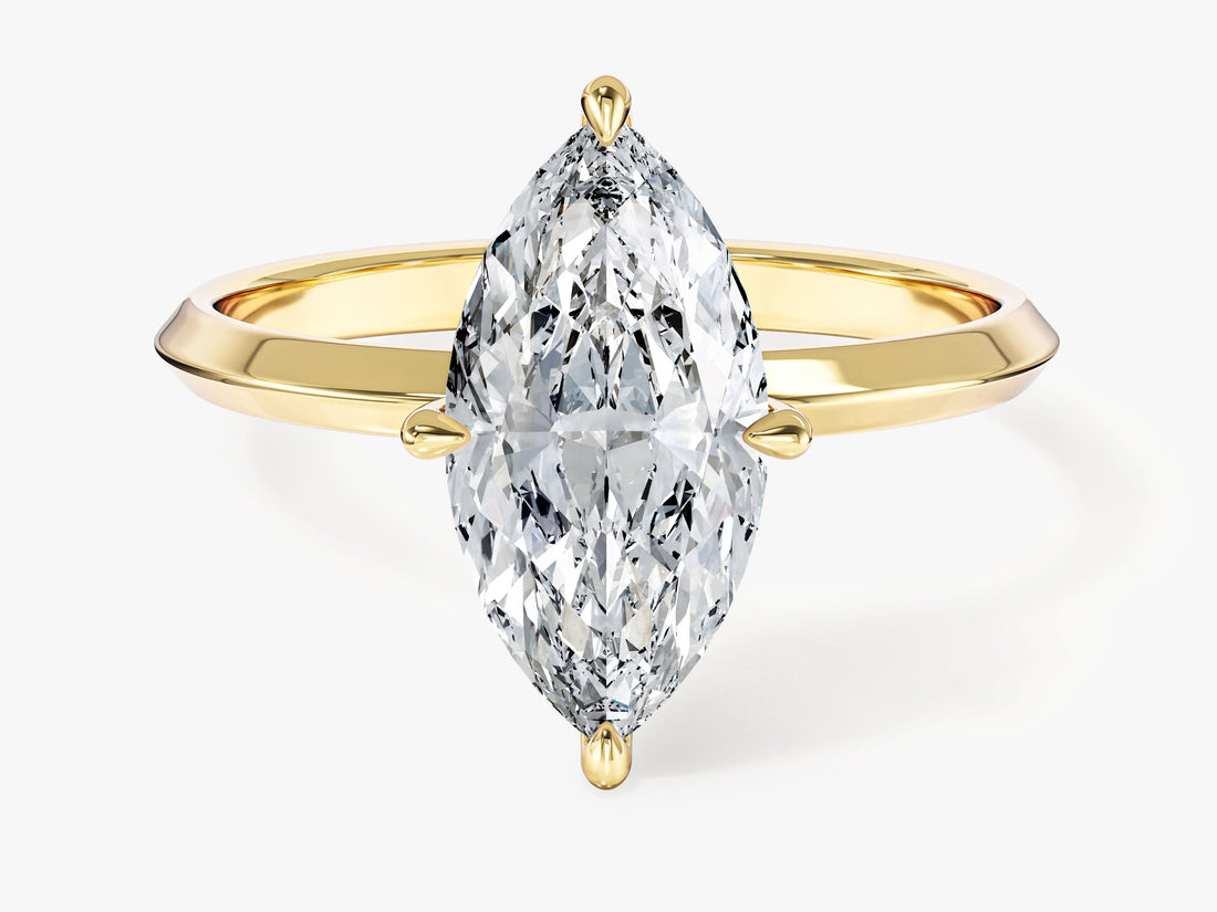 Marquise lab grown diamond knife edge solitaire engagement ring in yellow gold, front view