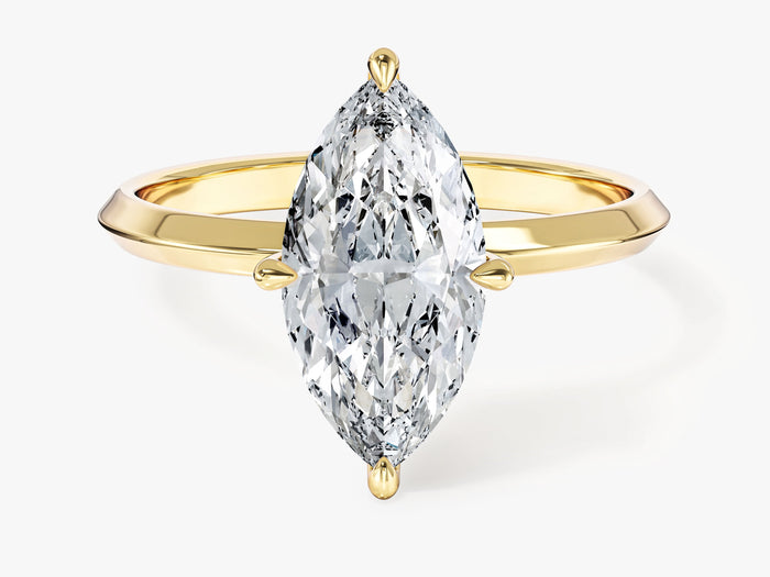 Marquise lab grown diamond knife edge solitaire engagement ring in yellow gold, front view