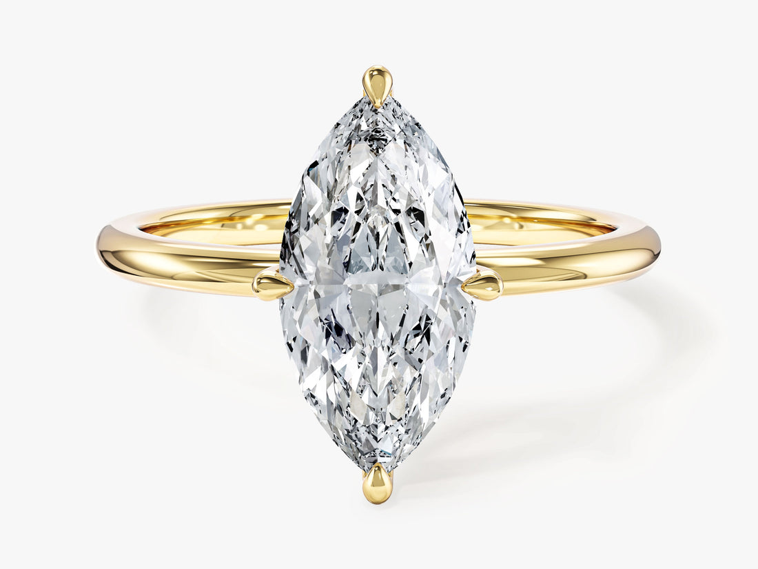 Classic marquise moissanite solitaire engagement ring in yellow gold, front view