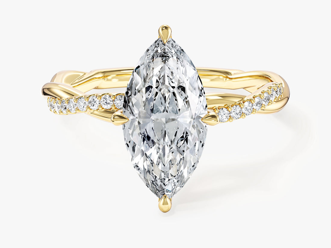 Marquise cut moissanite infinity twist engagement ring with pave side stones in 14K yellow gold, front view