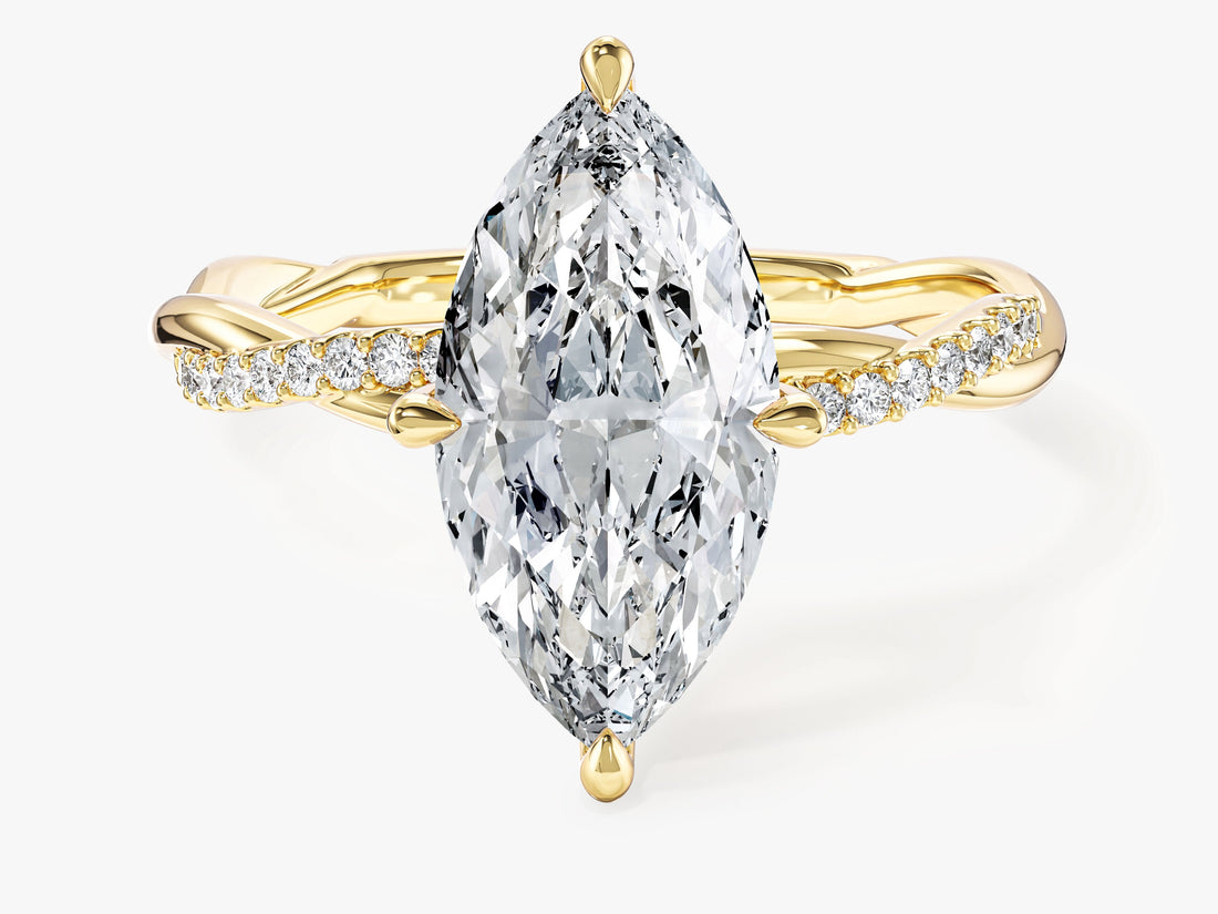 Large marquise moissanite statement engagement ring with twisted micro pave band in 14K yellow gold, front view