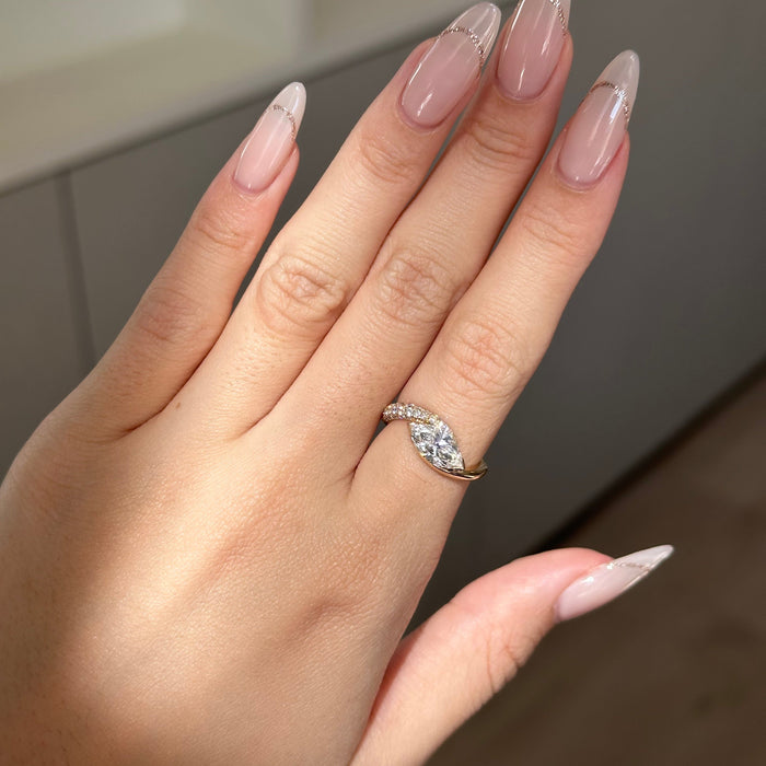 East west marquise moissanite twisted pave engagement ring in rose gold