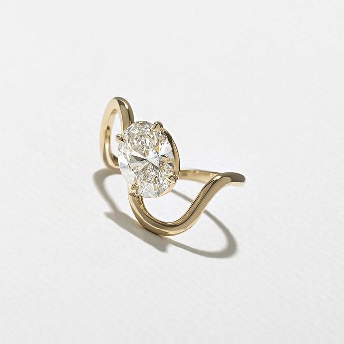 Oval cut moissanite open chevron shank solitaire engagement ring in yellow gold, view 2