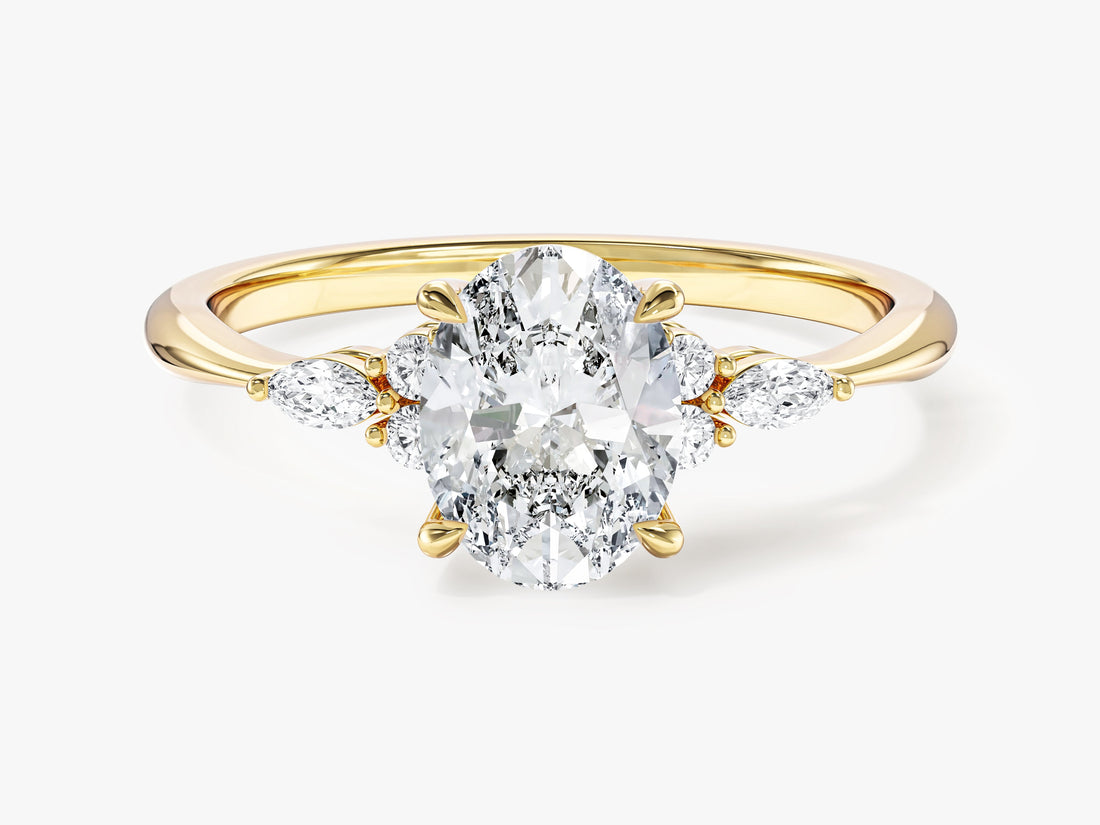 Oval moissanite seven stone cluster engagement ring on a tapered yellow gold band, front view