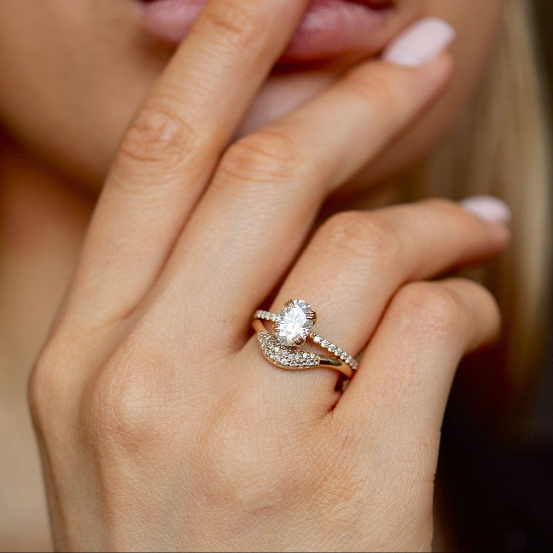 Oval cut moissanite double claw pave engagement ring in rose gold