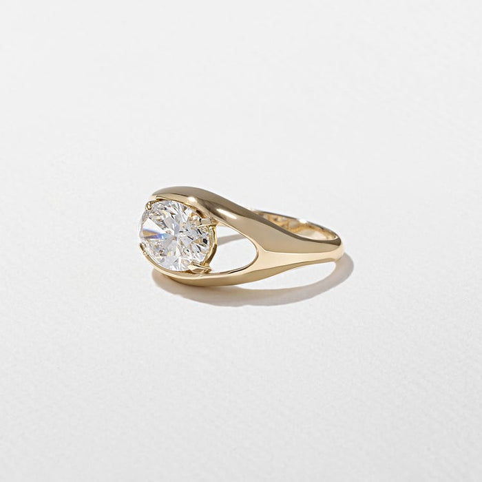 East west oval cut moissanite floating split shank engagement ring in yellow gold, view 2
