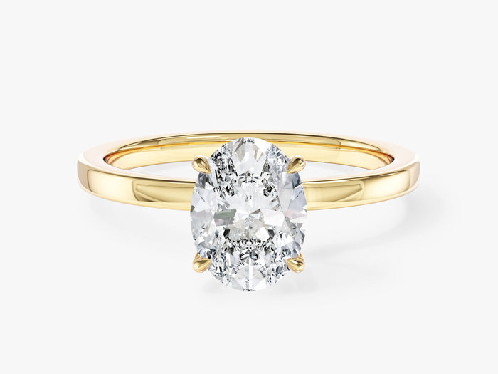 Oval lab grown diamond four claw solitaire with hidden halo and flat band in yellow gold, front view