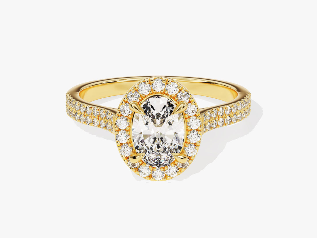 Four claw oval lab grown diamond pave halo engagement ring with two line diamond band in yellow gold, front view