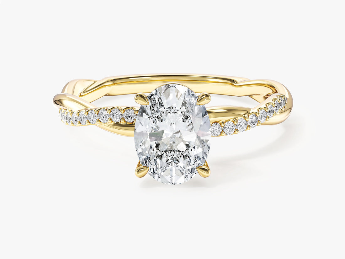 Oval lab grown diamond infinity twist engagement ring with micro pave strand in yellow gold, front view