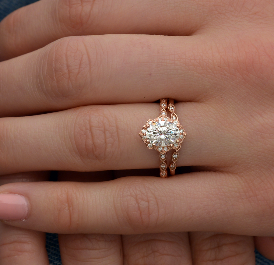Oval cut moissanite kite outline vintage halo engagement ring in rose gold