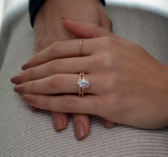 Oval cut moissanite kite outline vintage halo engagement ring in rose gold, view 2