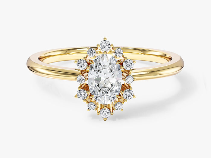 Oval lab grown diamond sunburst halo engagement ring in yellow gold, front view