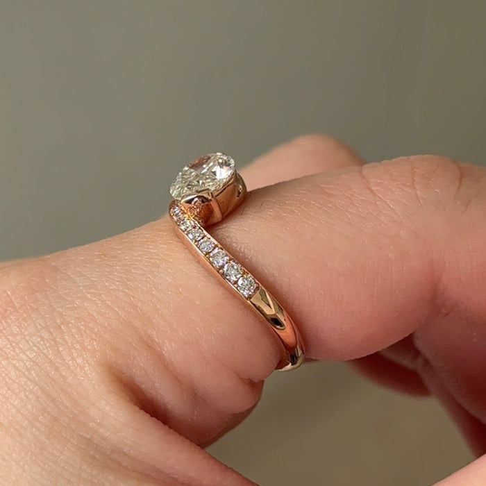 Oval cut moissanite swirl pave bypass engagement ring in rose gold, view 2
