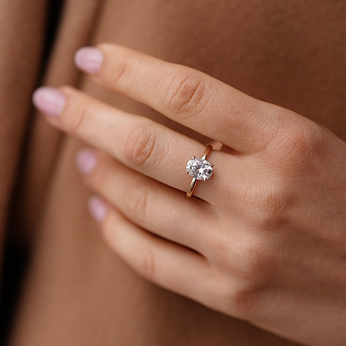 Oval cut moissanite classic solitaire engagement ring in rose gold