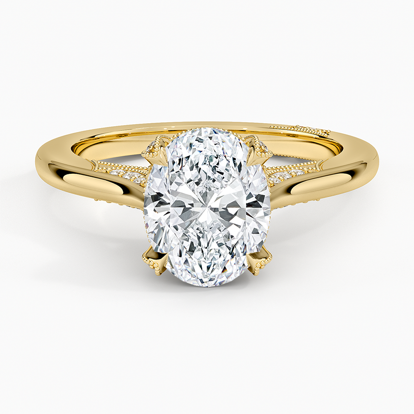 Oval moissanite milgrain split shoulder pave ring in yellow gold, top view