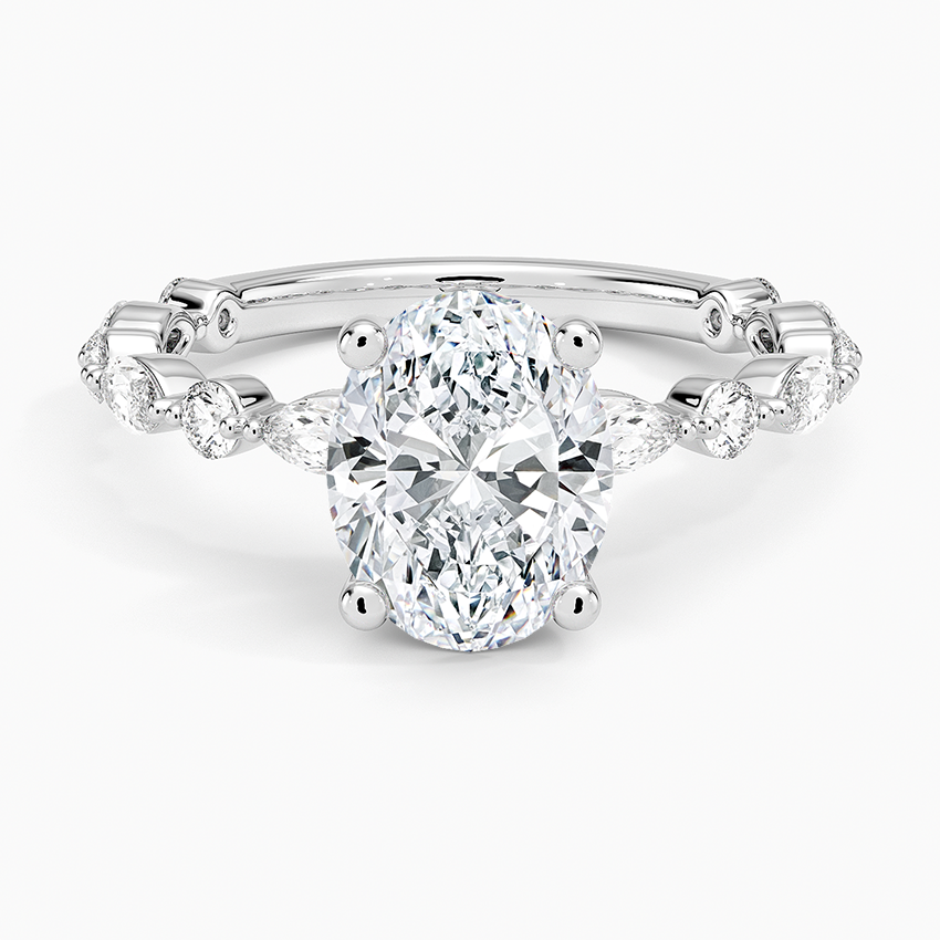 Oval moissanite ring with alternating marquise and round accents in white gold, top view