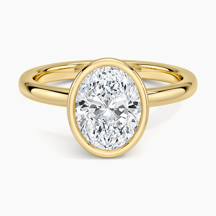 Full bezel oval moissanite on a slim yellow gold band, top view