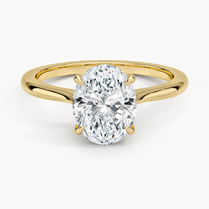 Oval moissanite cathedral solitaire in yellow gold, top view
