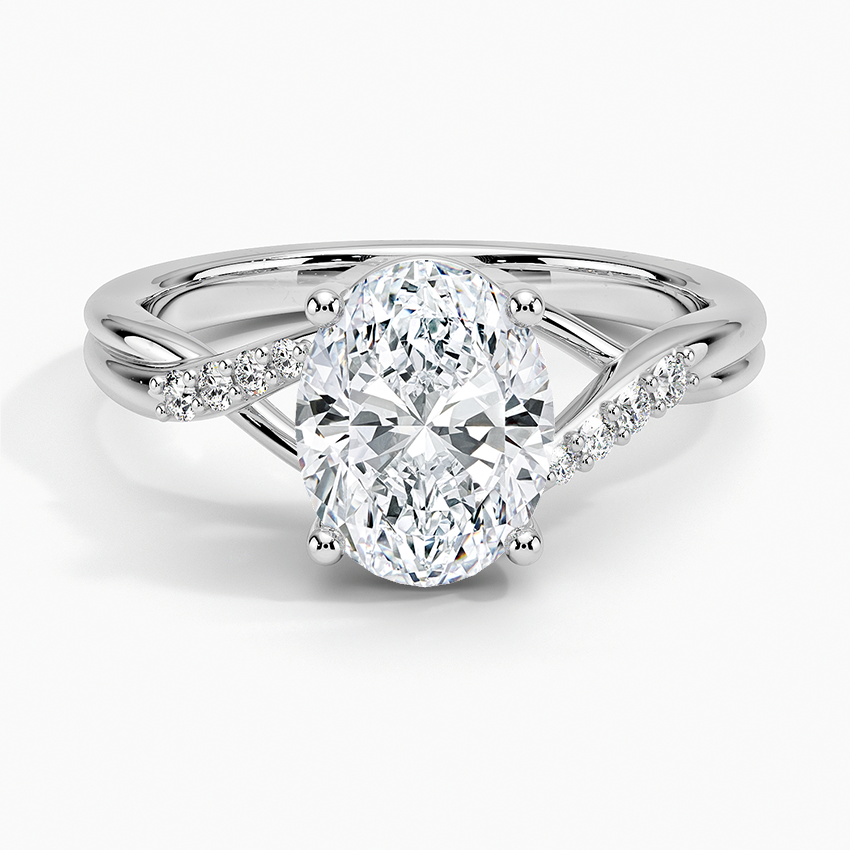 Oval moissanite ring with crossover twist split shank in white gold, top view