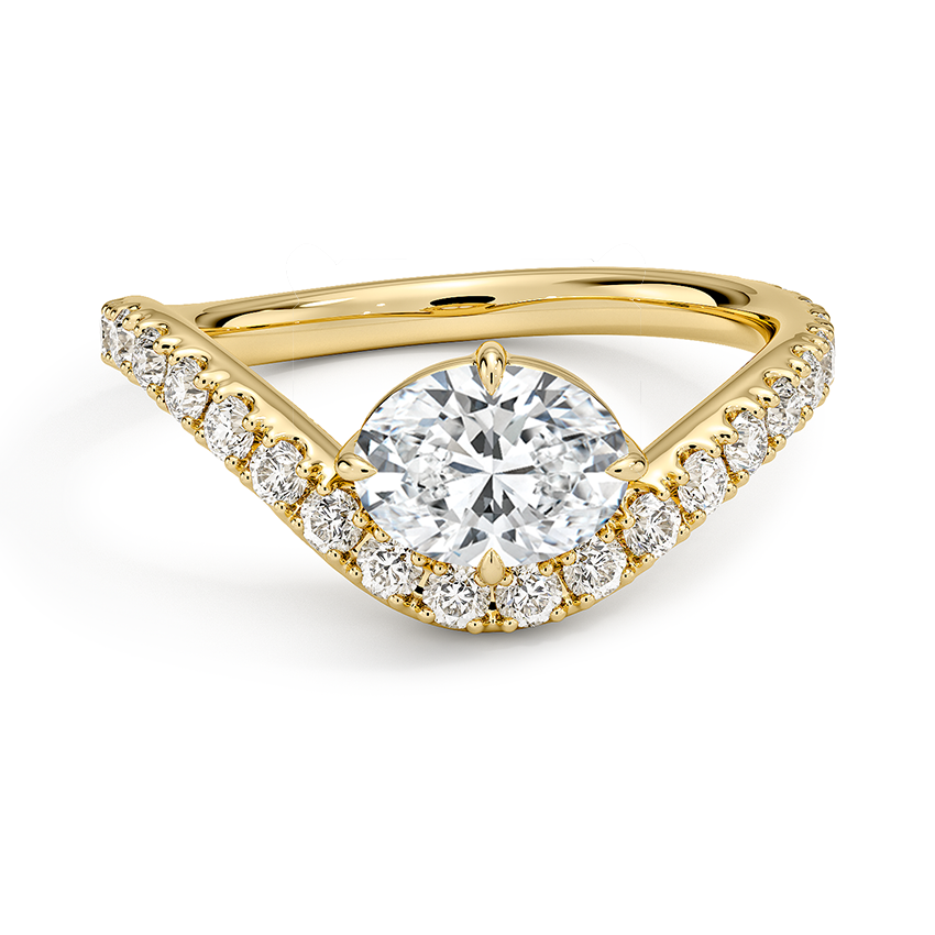 Moissanite set in the point of a chevron pave yellow gold band, top view